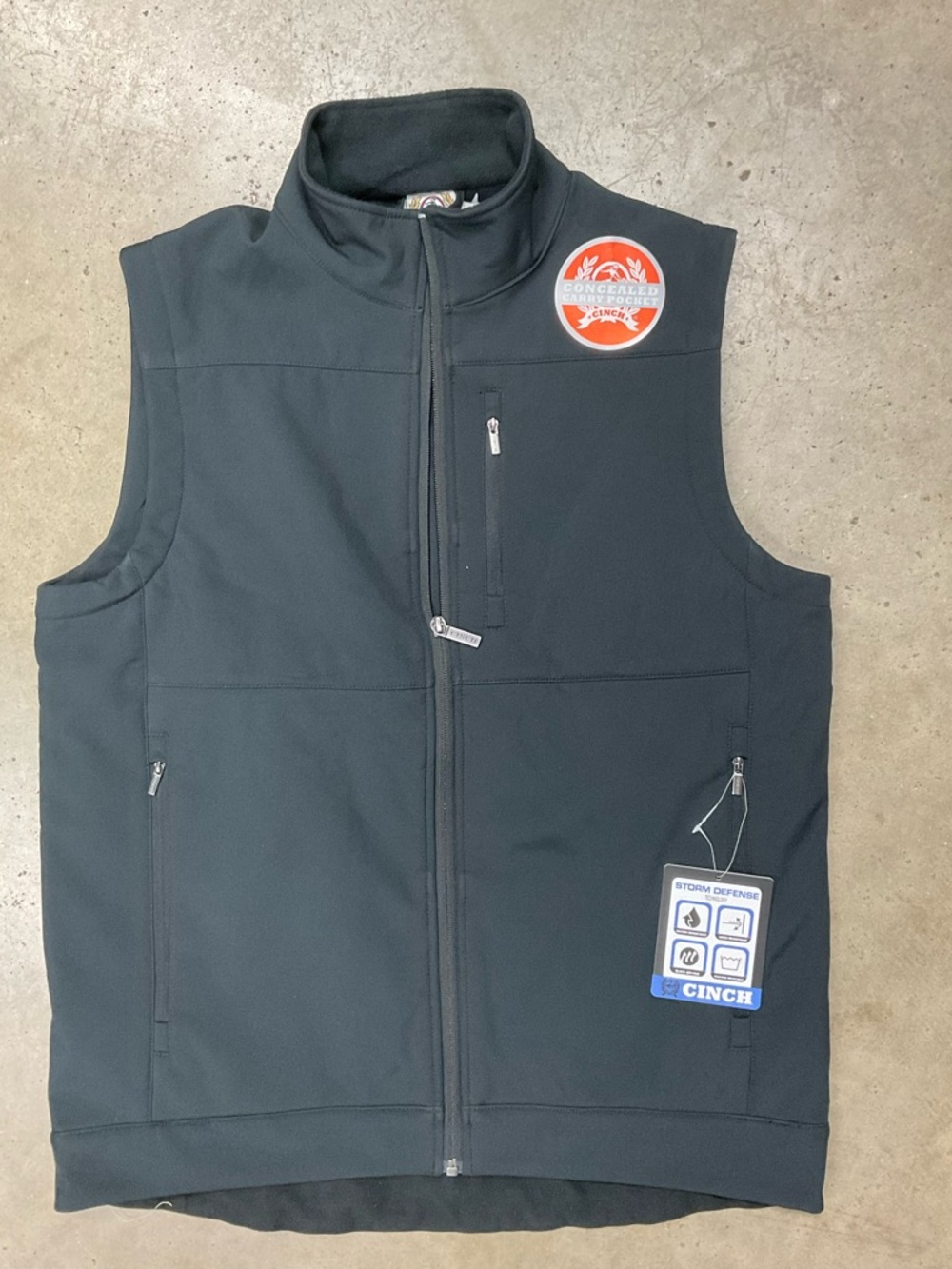 Cinch Black Softshell Vest with Orange Logo Patch
